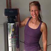 picture of Suzanne with water tank